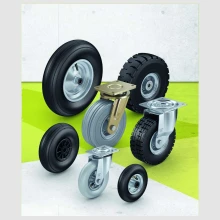 Wheels and castors with pneumatic tyres and superelastic solid rubber tyres